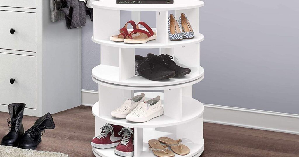 A white three-tiered shoe rack filled with various shoes, showcasing an organized shoe closet.